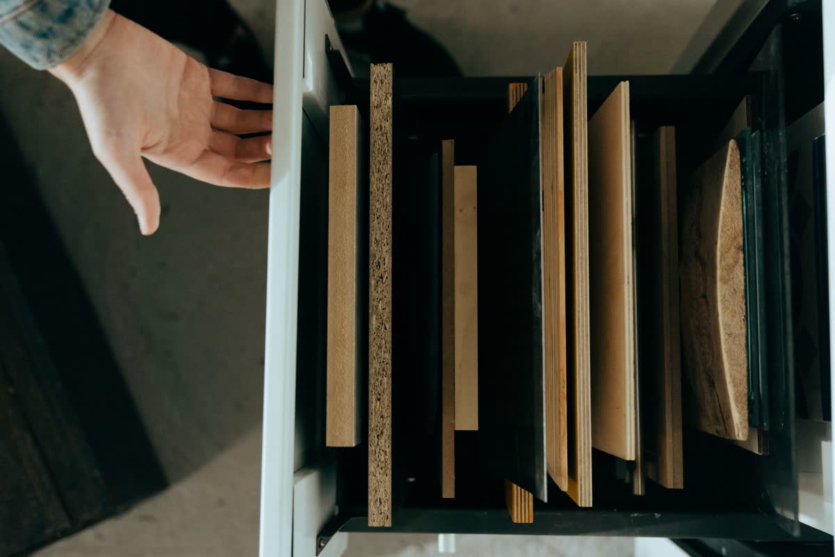 Picking wood panels from a rack